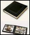 Pocket
  sized leather photo album