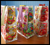 <strong>Recycled Juice Pouch Lunch Bag Craft for Kids</strong>