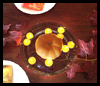 Pumpkin
  & Floating Candles Centerpiece