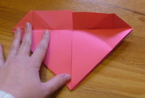 This should form your paper into a square shape with points facing north, 