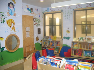 Kids Enjoying Reading in the Newly Painted Library