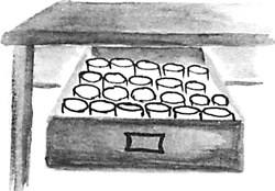 Tubes in Desk Drawers Organization
