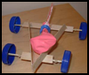 Make
  a balloon-powered car