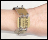 <B>How
  to Make a Credit-Card Bracelet</B>