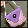 The Handbag Addiction Starts Early With a Felt Purse