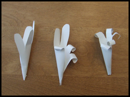 Turn Paper Inwards for Handprint Easter Lily Bouquet of Flowers Craft Activity for Kids
