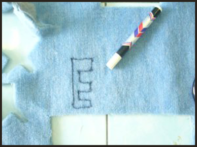 Trace the Alphabet Letters on the Felt for Alphabet Letters Tactile Guessing Game Craft
