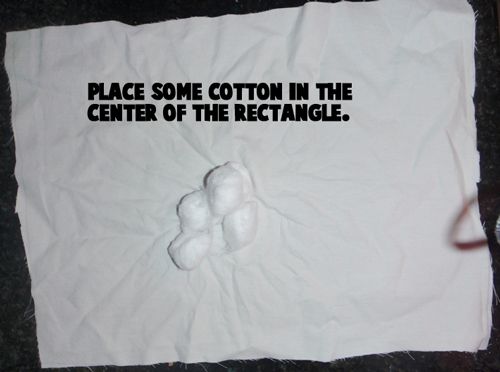 Place some cotton in the center of the rectangle