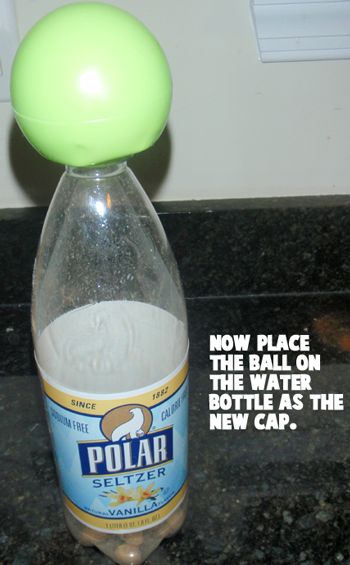 Now, place the ball on the water bottle as the new cap
