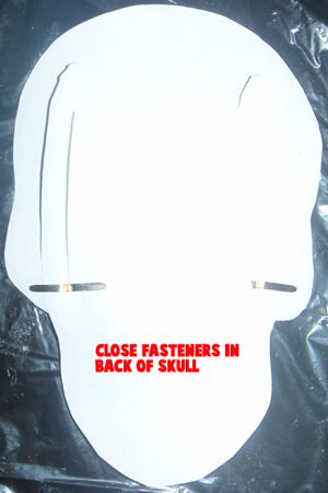  Close fasteners in back of skull