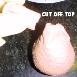 Cut off the top of the balloon