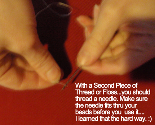 With a second piece of thread or floss... you should thread a needle. 
