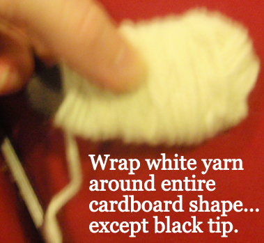 Wrap white yarn around entire cardboard shape