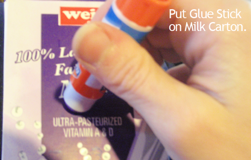 Put glue stick on milk carton.