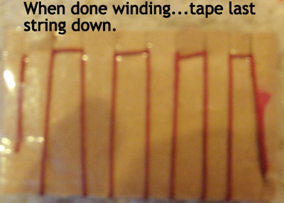 When done winding... tape last string down.