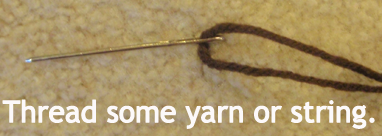 Thread some yarn or string.