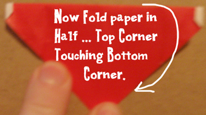 Now fold paper in half