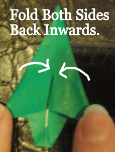Fold both sides back inwards.