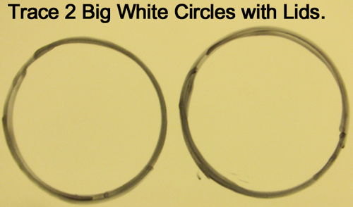 Trace 2 big white circles with lids.
