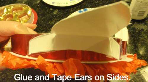 Glue and tape ears on sides.