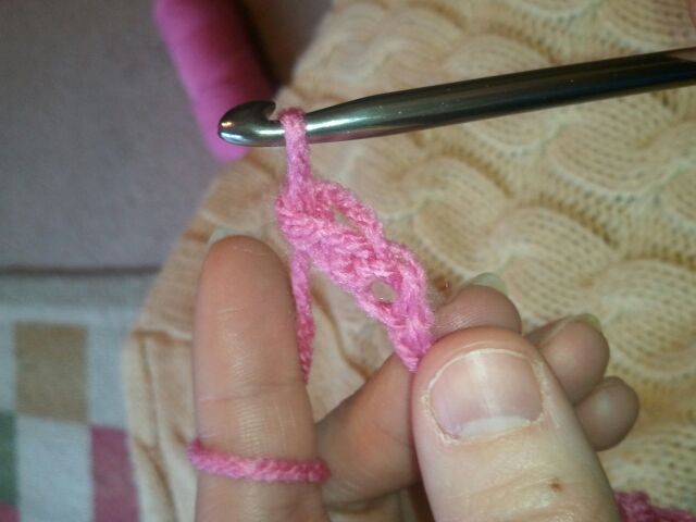 pull that yarn through both stitches on the crochet hook.