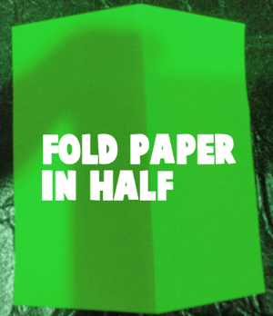 Fold paper in half.