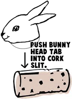 Push bunny head tab into cork slit.