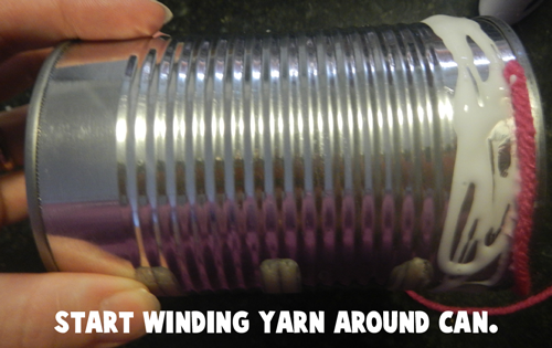 Start winding yarn around can.