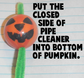Put the closed side of pipe cleaner into bottom of pumpkin