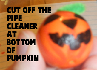 Cut off the pipe cleaner at bottom of pumpkin