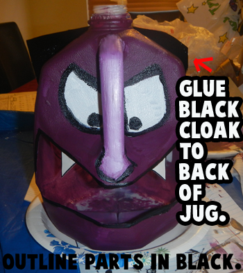 Glue black cloak to back of jug.  Outline parts in black.