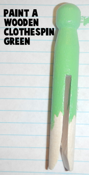 Paint a wooden clothespin green.
