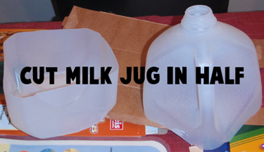 Cut milk jug in half.
