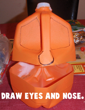  Draw eyes and nose.