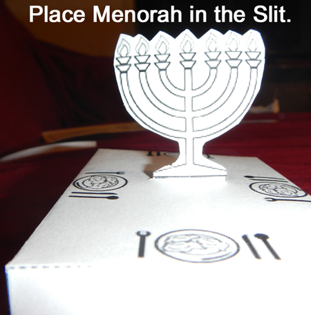Place menorah in the slit.