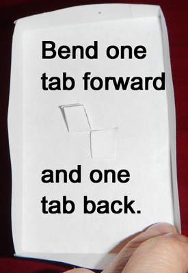 Bend one tab forward and one tab back.