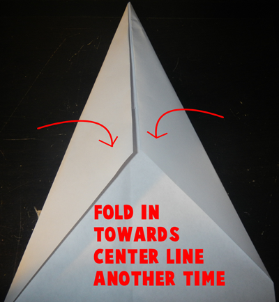  Fold in towards center line another time.