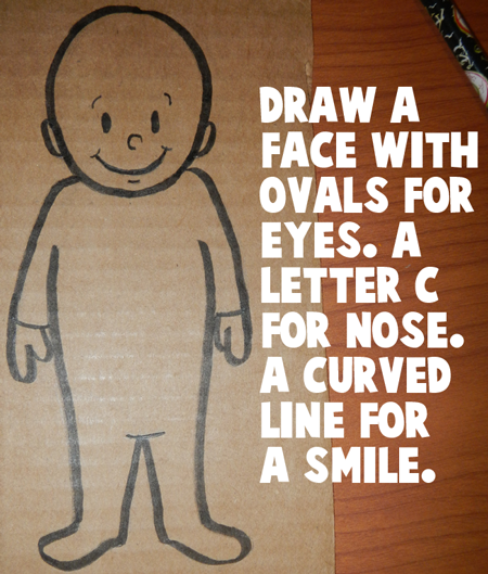 Draw a face on the doll.