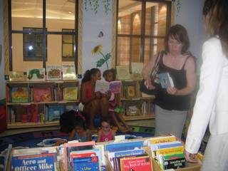 Kids Enjoying Reading in the Newly Painted Library