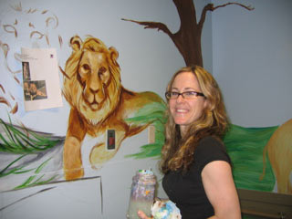 Lauren is a talented artist and she is painting lions in the Beautiful Donated Mt. Sinai Prediatric Treatment Room Mural